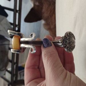 Vintage cuff bracelet made of sterling silver fork with an exquisite amber stone